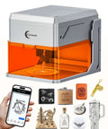Carverall A1 Pro 10W mini laser engraver with camera, gray aluminum desktop engraving machine with orange safety cover.