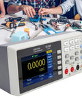 Compact Desktop Multimeter With 55000 Counts And A 3.7 Inch LCD Display, Handy Digital Tester in use on a workshop table
