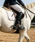 Old School Western Cowboy Spurs With German Silver Hand Engraved Trims Jingle Bobs Rowel on rider's boot on white horse