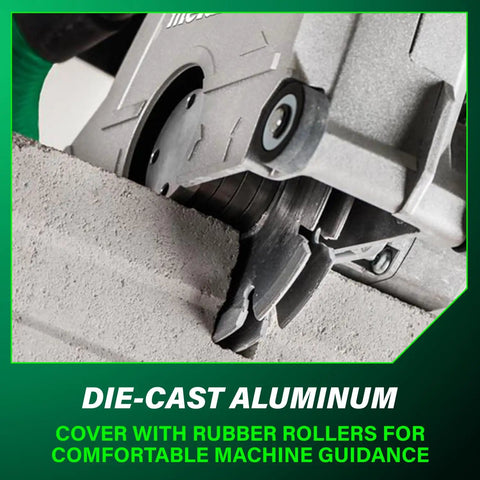 Close-up of a Heavy Duty 5 Inch Wall Chaser cutting concrete with die-cast aluminum cover and rubber rollers for guidance.
