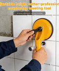 Person using Adjustable Vacuum Suction Seam Clamp For Floor Gap Fixing And Tile Alignment, Pro Grade Heavy Duty Rubber Cups on tile wall