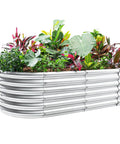 Heavy Duty Galvanized Raised Garden Bed Kit for Veggies, oval 4 by 2 by 1.5 feet, filled with plants, durable metal construction