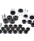 Badass Rear Suspension Bushing Kit For Subaru Impreza 1993 To 2000 showing black and silver bushings and sleeves arranged on white background.