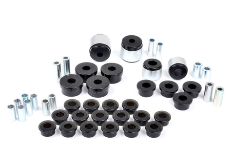 Badass Rear Suspension Bushing Kit For Subaru Impreza 1993 To 2000 showing black and silver bushings and sleeves arranged on white background.