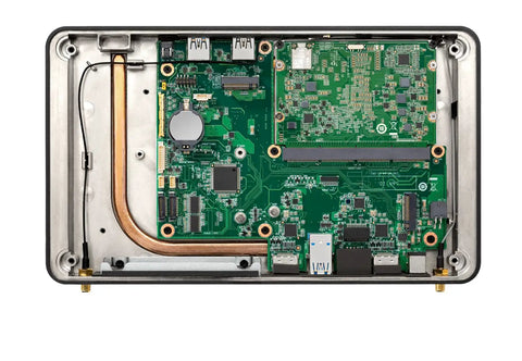 Heavy Duty Rugged Mini Computer With No Sweat Fanless Cooling Running Beefy Intel Core I5 Eight Three Six Five U internal circuit board and components.