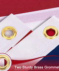 Close-up of brass grommets on heavy duty 4x6 outdoor nylon US flag with embroidered stars sewn stripes fade resistant weatherproof