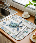 Blue Starfish Shell Conch Wood Grain Dish Drying Mat For Kitchen Counter Super Fast-Drying Ultra Absorbent Microfiber Drainer Pad Three Layer Sponge Core Reversible Drying Pad 18 by 24 Inches Non Slip in coastal design with turtle print.