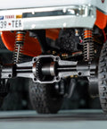Close-up view of axle with Beefed Up 12/24T Steel Alloy Stock Gear Set and 12/20T Overdrive Helical Gear Kit for 1/24 RC cars