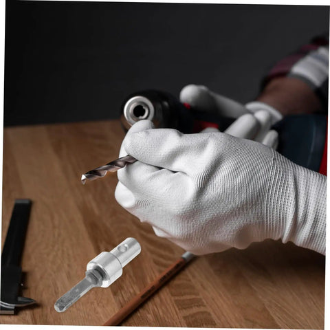 Person holding Earth Auger Drill Bit Adapter Converter For Electric Hammer Drill near a wooden surface