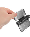 Hand holding Heavy Duty Spring Loaded Door Hinges For Auto Doors And Truck Compartments, Black Iron With Thickened Welding