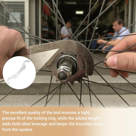 Bicycle Headset Lockring Wrench With Dual Radius Hooks being used to tighten a lock ring on a bike wheel hub