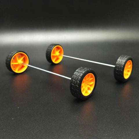 Wheels and axles from 82 Piece Plastic Gear Kit For DIY Toy Cars And Robots Complete Gear Pack With Pulleys Racks Belts Bushings