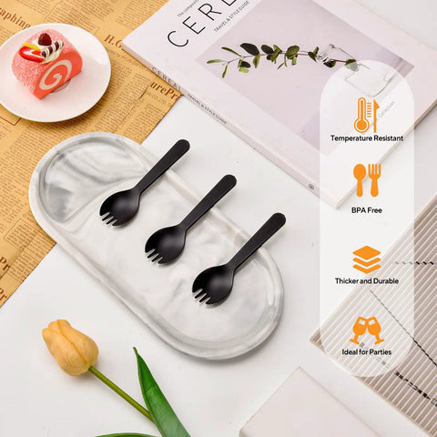 Mini Black Sporks 4.2 Inch 100 Pack Individually Wrapped Disposable Cutlery Set displayed on tray with dessert and magazine