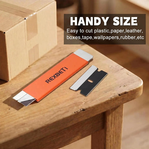 12 Pack Retractable Box Cutter Set With Sharpened Antirust Carbon Steel Blades on a table next to a cardboard box