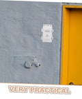 Ultimate Outdoor Waterproof Electrical Junction Box For Surveillance And Electronic Gear Durable Plastic Enclosure mounted on a gray wall.