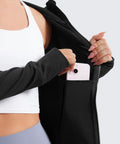 Cozy Womens Fleece Full Zip Hoodie With Thumb Holes Black Hip Length Go To Casual Sweatshirt Jacket showing hidden pocket feature