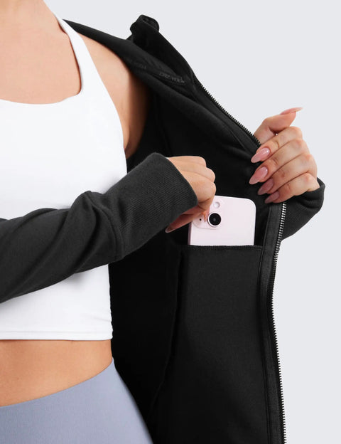 Cozy Womens Fleece Full Zip Hoodie With Thumb Holes Black Hip Length Go To Casual Sweatshirt Jacket showing hidden pocket feature