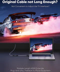 Boost Your Setup With Smooth 8K Output And Glitch Free 4K Gaming Via Zero Latency HDMI 2.1 Male To Female Extension Cable plugged into a laptop.