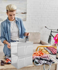 Layered Hanging Storage Bag Slick Nonwoven Closet Organizer With Roomy Pockets Low Key, stacking clothes and accessories, stylish design.
