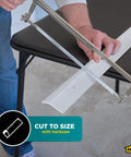 Person cutting Durable Aluminum Carpet Trim Built To Last One And Three Eighths Inch By Thirty Six Inch Silver with hacksaw