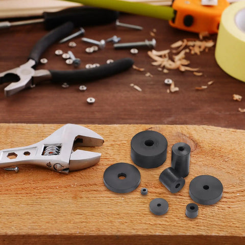 25 Pack Rubber Spacers 16mm OD 4mm ID 15mm Thick Black Round Anti Vibration Pads on workshop bench