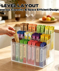 Hand accessing a Three Tier Drink Packet Organizer Rack With Twelve Compartments Sugar Packets Powdered Drink Mix Holder
