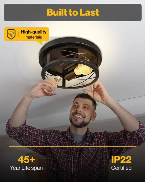 Farmhouse Industrial Ceiling Light Fixtures 11 Inch Matte Black Cage With Dual E26 Sockets installed in ceiling, man changing bulb