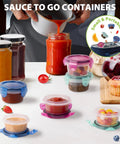 6 Pack 2.7 Oz Condiment Containers With Leakproof Lids, filled with sauces and snacks, arranged on a kitchen counter