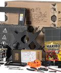 MK4S 3D Printer Kit with Automatic Calibration and Removable Sheets components, including parts and printed handbook, for DIY setup.