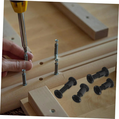 Rock Solid Cross Locking Screws And Nuts 170 Piece Set Matte Black Steel, being installed into furniture joints.