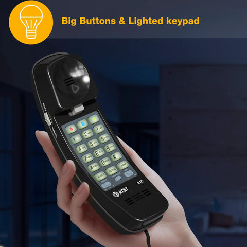 Straight Up Reliable Trimline Corded Landline Phone Works Like A Dream With Bright Backlit Keypad close-up of lighted keypad in hand