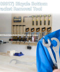 Double Ended Bicycle Bottom Bracket Lockring Wrench And Removal Tool for cup-and-cone systems in workshop setting.