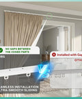 Retractable Ceiling Curtain Track Kit 11 To 12 Foot Aluminum White Rod System With Adjustable Length installed above doorway, no gaps
