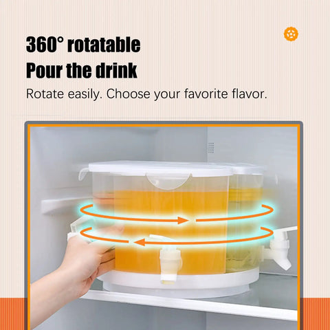 Five Point Five Liter Rotating Beverage Dispenser With Four Separate Compartments And Dripless Spigot, shown rotating in fridge, with orange juice.