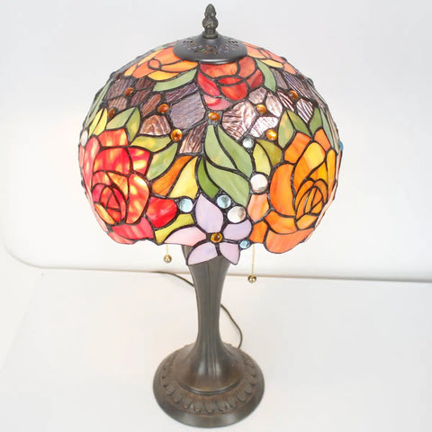 Tiffany Style Stained Glass Table Lamp With Red Rose Pattern, 12 Inch Shade, 22 Inch Tall, Resin Antique Green Bronze Base, Pull Chain, UL Listed, Cozy Bedside Desk Reading Light For Living Room And Home Office.
