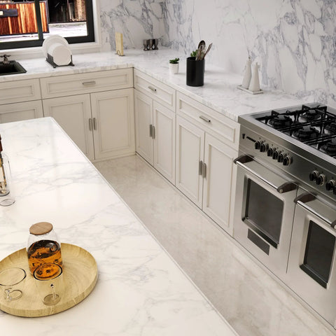 Modern kitchen with marble countertops and 10 pack adjustable cabinet handles in brushed nickel square satin finish drawer pulls.