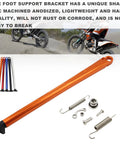 Orange Dirt Bike Kickstand Foot Side With Spring For KTM XC XCW XCF XCFW EXC EXCF EXCR Models, close-up view with accessories