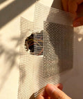 Applying Self Adhesive Drywall Patch 4x4 Inch Aluminum Mesh Patch Kit For Walls Furniture Ceilings And Doors Instant Quick Fix For Home Office Rentals And Diy Repairs over a wall hole