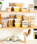 60 Count Deli Containers With Lids For Grab And Go Meals, 32 Oz 16 Oz 8 Oz Sets, stacked on kitchen shelves with various foods