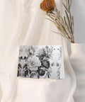 Floral Graphite Print Greeting Cards Half Fold For All Occasions In White Photo Paper 4x6 Inches placed against white fabric