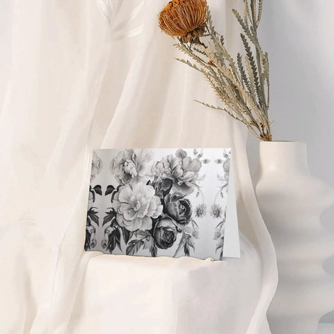 Floral Graphite Print Greeting Cards Half Fold For All Occasions In White Photo Paper 4x6 Inches placed against white fabric