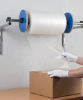 Slick Wall Mount Bubble Wrap Dispenser With Heavy Duty Galvanized Steel And Smooth Tidy Rewind Ready Packs Shipping Fits Air Cushion Film Rolls Up To Forty Inches Wide, dispensing bubble wrap onto a box.
