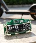 Replacement Control Board For E2 Pro Electric Scooter Upgrade To Restore Display And Throttle, shown on a stone surface.