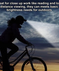 Silhouette of cyclist using 2 Pack LED Baseball Caps With Built In Headlamps Hands Free Light For Men Fishing Jogging Camping Work USB Rechargeable Battery Powered Hats Black Grey at dusk
