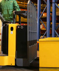 Heavy Duty Electric Ride On Pallet Jack Truck 5500 LB Capacity with operator in warehouse ready for heavy lifting.