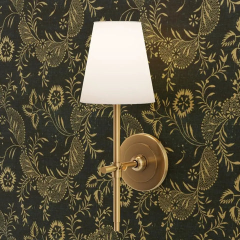 Kickstart Your Vibe With This Fresh Indigo Floral Folk Wallpaper Featuring A Slick Gold Metallic Coating Premium Paste The Wall Covering Eco Certified Type I Rated with wall sconce illuminating dark wallpaper.