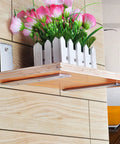 Heavy Duty Stainless Steel Shelf Brackets supporting a wooden shelf with flowers, 8.86 inch mounts for DIY upgrades.