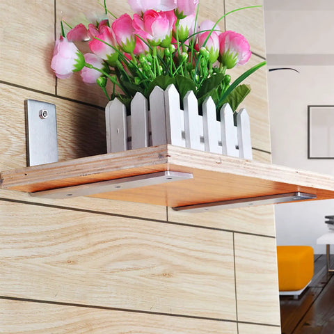 Heavy Duty Stainless Steel Shelf Brackets supporting a wooden shelf with flowers, 8.86 inch mounts for DIY upgrades.