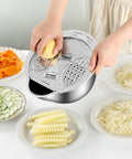 Person grating potato on Stainless Steel Rice Strainer Colander with Side Drain, Grater Lid, V-Shaped Bottom, in kitchen setting.