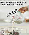 Two Piece Glass Measuring Cups Set With 1 Cup And 2 Cup Sizes, in use pouring liquid into bowl
